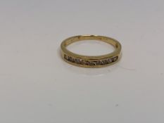 An 18ct gold nine stone diamond ring, 2g.