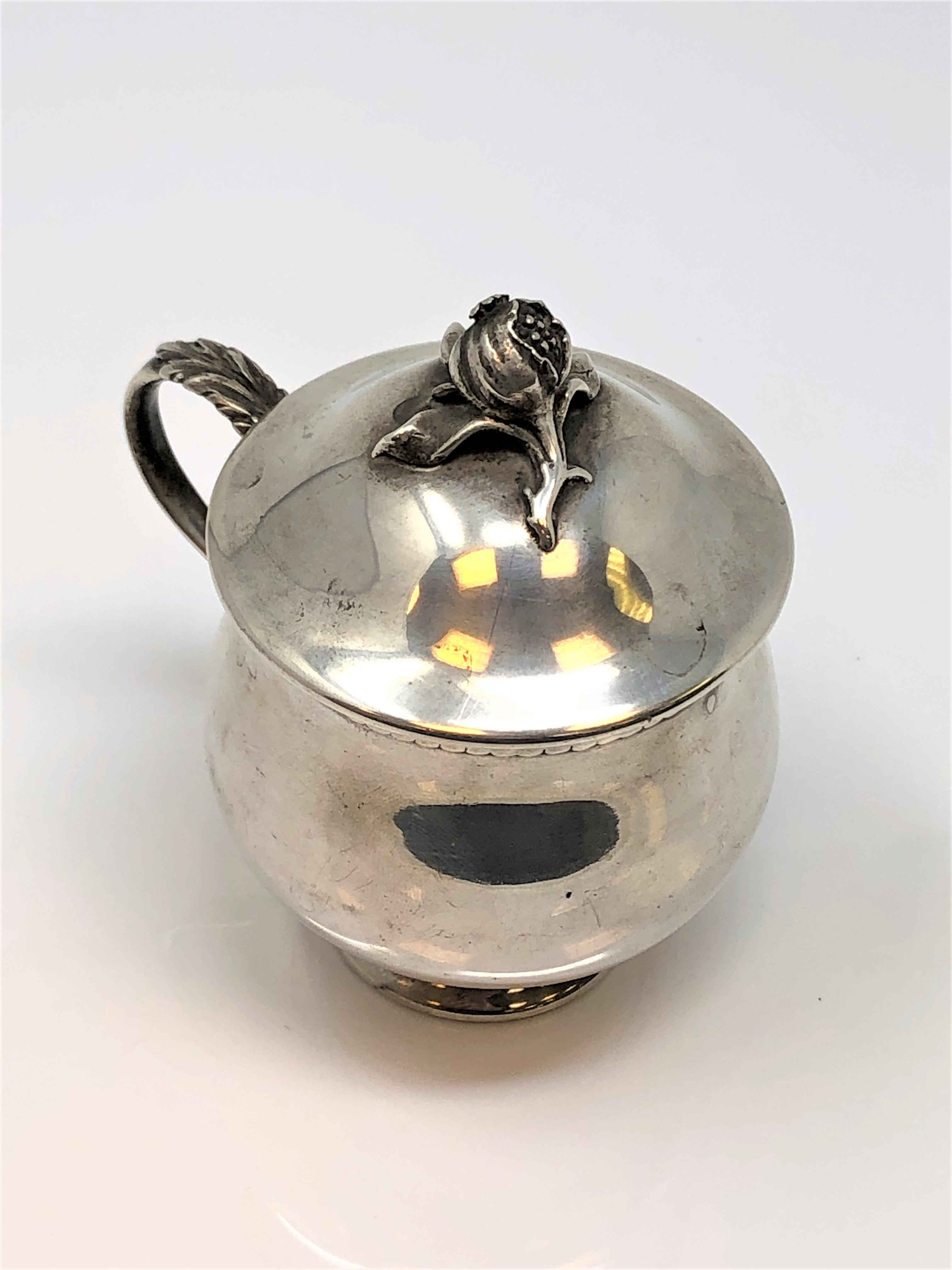 A large late eighteenth century silver mustard pot, indistinct marks.