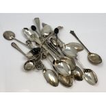 A large quantity of silver spoons and other items.