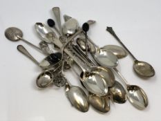 A large quantity of silver spoons and other items.