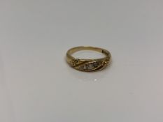 An antique 18ct gold five stone diamond ring,