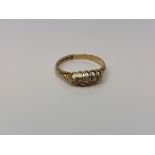 An antique 18ct gold five stone diamond ring, size M CONDITION REPORT: 1.