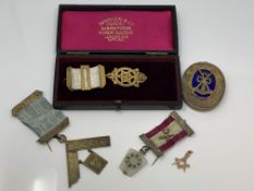 A group of gold and silver Masonic items