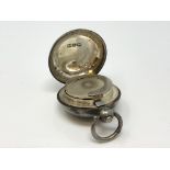 An antique silver sovereign case,