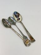 Three good quality enamelled silver spoons