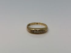 An antique 18ct gold five stone diamond ring, size L1/2 CONDITION REPORT: 2.