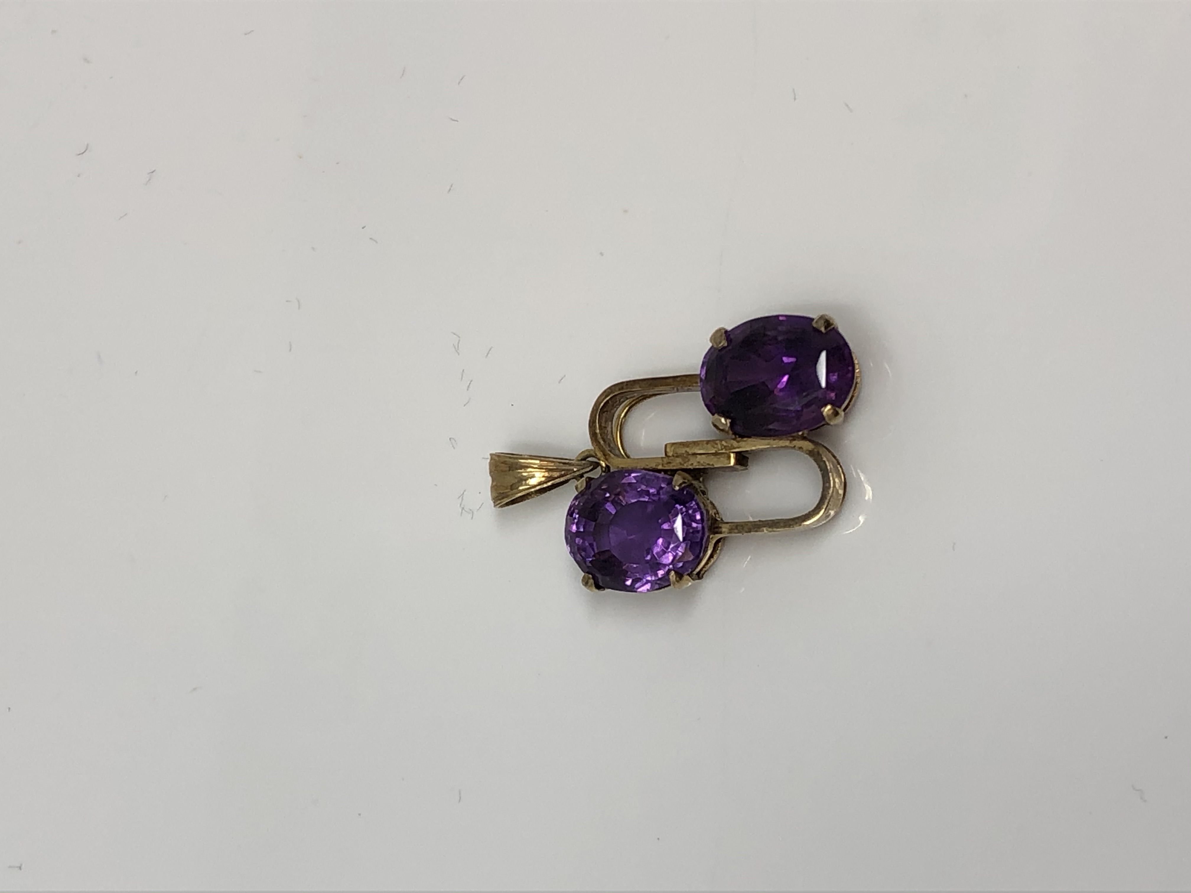 A 9ct gold amethyst set pendant
