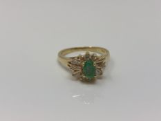 An 18ct gold emerald dress ring, size K CONDITION REPORT: 3.