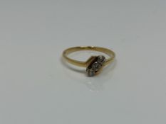 An antique 18ct gold three stone diamond ring, size O CONDITION REPORT: 1.