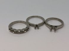 Three vacant platinum ring mounts (3) CONDITION REPORT: 15.