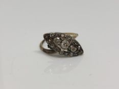 An antique 18ct gold marquise shaped diamond set ring (a/f) CONDITION REPORT: