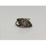 An antique 18ct gold marquise shaped diamond set ring (a/f) CONDITION REPORT: