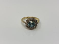 An antique 18ct gold platinum and blue zircon cluster ring,