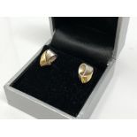 A pair of two tone 18ct gold diamond set earrings CONDITION REPORT: 3.