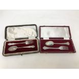 Two boxed silver fork and spoon sets