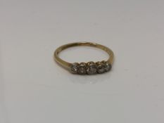 An antique 18ct gold five stone diamond ring, size R1/2 CONDITION REPORT: 1.