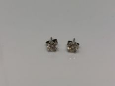 A good pair of 18ct white gold solitaire diamond earrings, approx. 1.