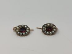 A pair of rose gold garnet and seed pearl earrings. CONDITION REPORT: 1.