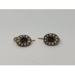 A pair of rose gold garnet and seed pearl earrings. CONDITION REPORT: 1.