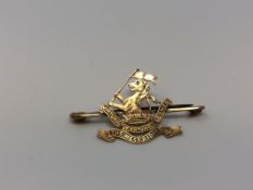 A 9ct gold West Riding Regiment brooch CONDITION REPORT: 2.