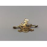 A 9ct gold West Riding Regiment brooch CONDITION REPORT: 2.