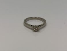 An 18ct white gold solitaire diamond ring, approx. 0.