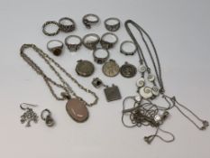 A group of silver jewellery to include rose quartz pendant on chain, various dress rings,