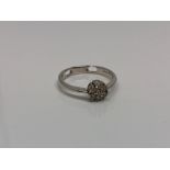 An 18ct white gold swivel ring/pendant CONDITION REPORT: 2.