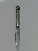 A small Georg Jensen silver butter knife