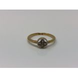 An antique 18ct gold gold four stone diamond ring, size N CONDITION REPORT: 2.