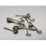 Eleven silver salt and mustard spoons