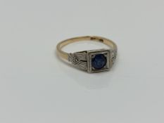 An 18ct gold sapphire and diamond ring, size L CONDITION REPORT: 2.