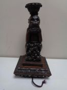 An early twentieth century carved oak figure of a Monkey converted to a lamp