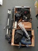 Two boxes of camera tripods, camera bags, Nikon Coolpix camera,