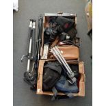 Two boxes of camera tripods, camera bags, Nikon Coolpix camera,