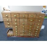 A large pine nineteenth century multi drawer chest