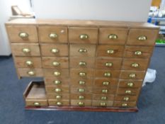 A large pine nineteenth century multi drawer chest