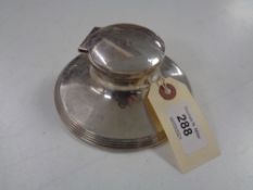 A silver capstan inkwell CONDITION REPORT: Top hinged lid is entirely seperate and