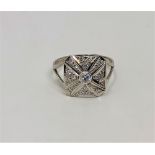 An 18ct white gold diamond set ring, size V. With certification.