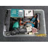 A crate of tools, disc sander,