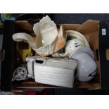 A box of large ceramic swan planter, decorative plates,