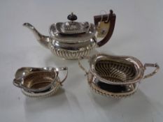 A three piece silver bachelor's tea service, Richard Richardson Sheffield 1898, 654.7g.