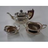 A three piece silver bachelor's tea service, Richard Richardson Sheffield 1898, 654.7g.