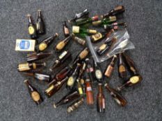 A quantity of miniature and other bar top bottles