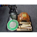 A tray of antique Wills Woodbine metal mirror, Art Deco mantel clock, antique lamp,