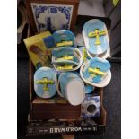 A box of Utterly Butterly dishes, blue and white caddy,
