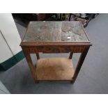 An Eastern side table with glass top together with two drawer metal chest with key and Dyson vac