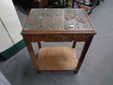 An Eastern side table with glass top together with two drawer metal chest with key and Dyson vac