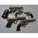 A quantity of miniature ornamental pistols
