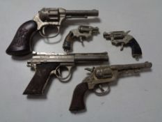 A quantity of miniature ornamental pistols